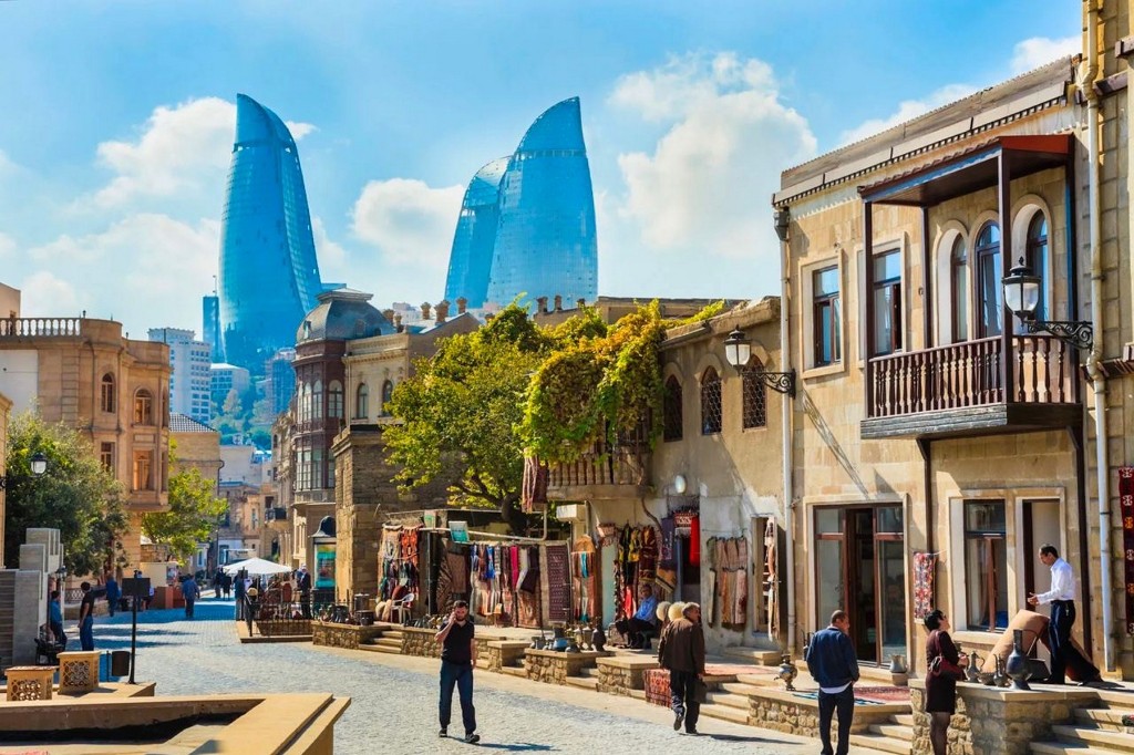 Old City street with Flame Towers in the background